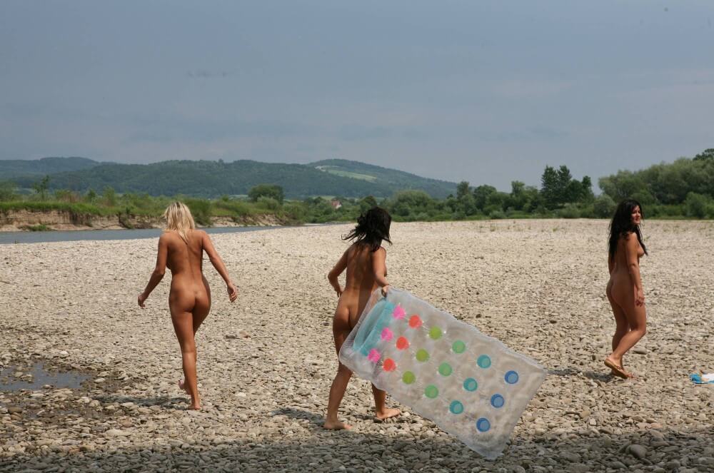 Naturist Park Floating On River photos - Nudism as a way to overcome body image issues and stereotypes