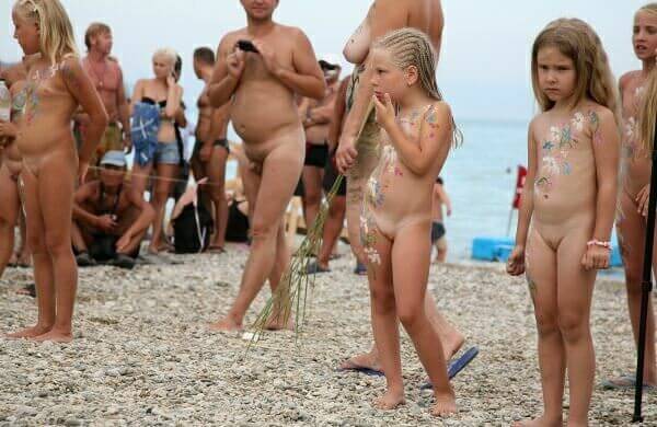Nudism photo gallery # 1 - Watching naked nudists