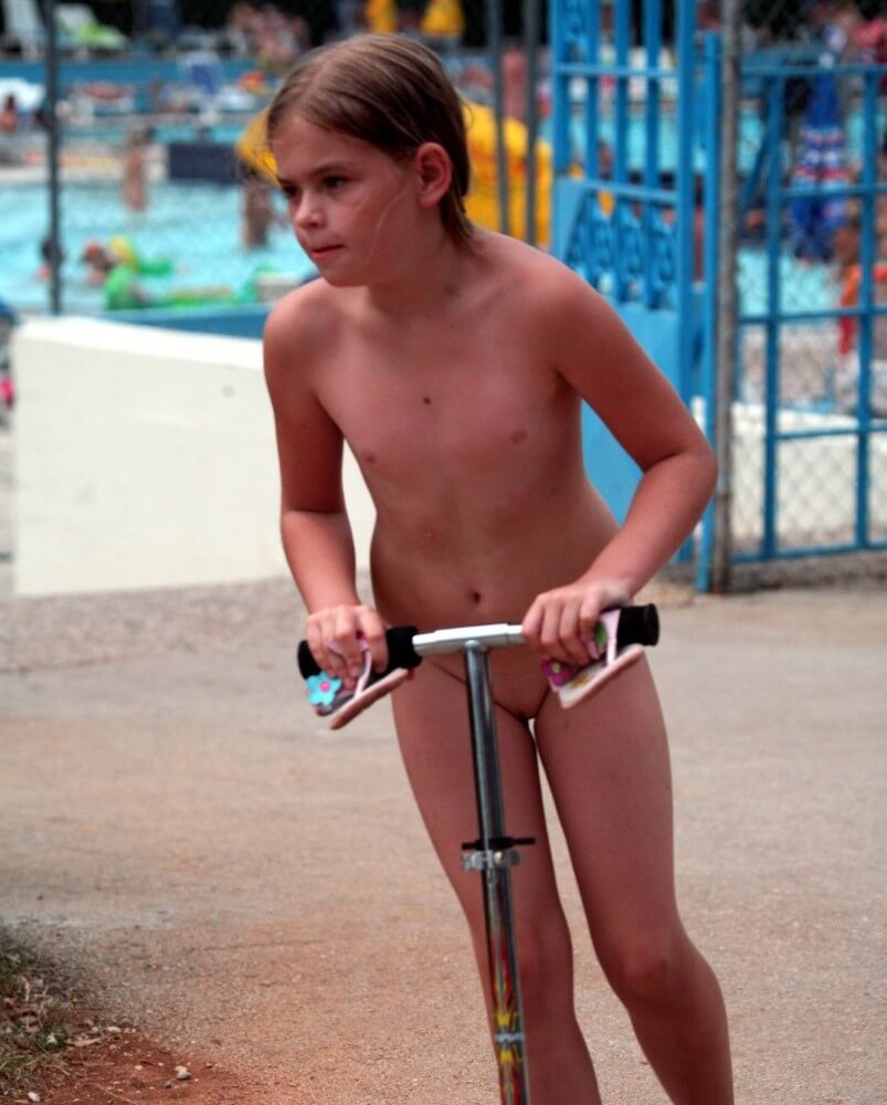 Pool-Side Naturist Scooter pics - Nudity in nudism is a form of honesty with oneself