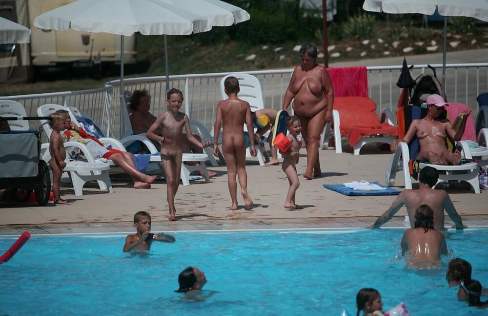 Naturist Afternoon Pool Games pics - Naturism and nudism as a path to inner freedom, harmony, and acceptance