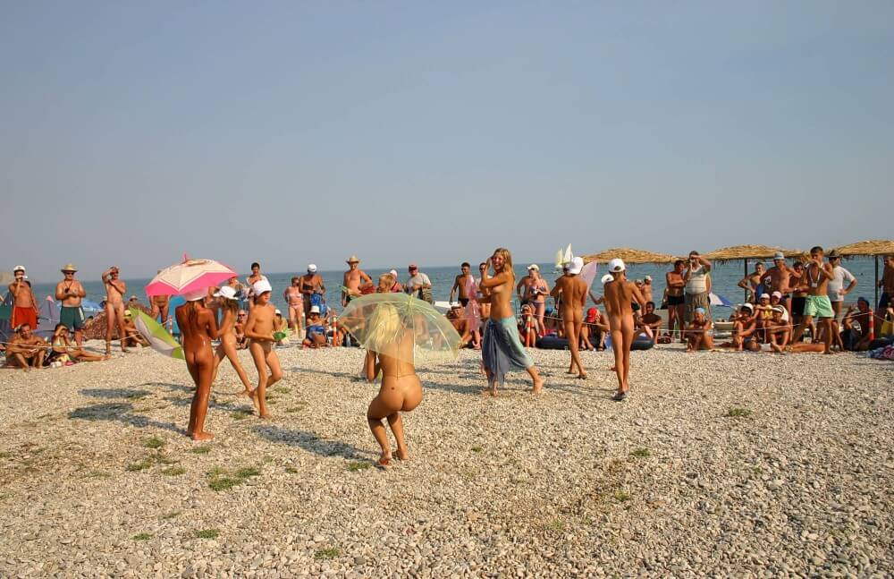Ribbon and Umbrella Dance pics - People who participate in nude recreation seek psychological comfort