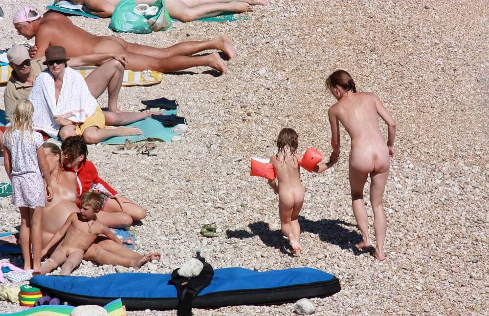 Orange Floaty Safety First Naturist pics - What the concept of naturist recreation entails and its benefits